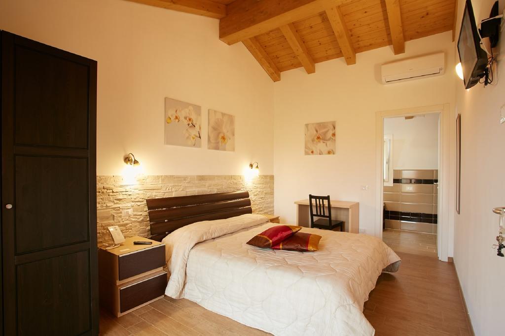 Camera Matrimoniale Deluxe con 1 Letto Supplementare